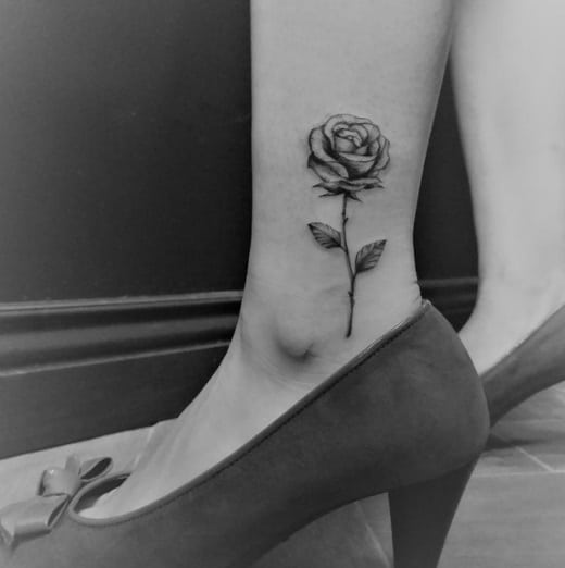 rose ankle tattoo design for woman