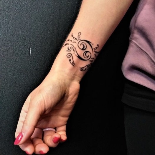 cancer zodiac sign wrist tattoo 