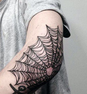 tattoo on the elbow cobweb 
