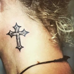 women cross tattoo on the neck 