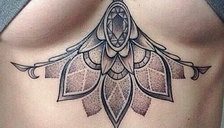 tattoo between brests decorative 