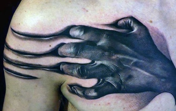 hand tattoo on chest for men