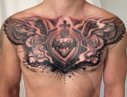 religion tattoo on chest for men