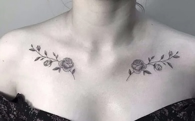 flowers tattoo on the clavicle