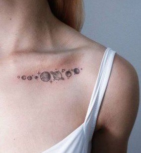 for woman tattoo on the collarbone