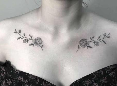 roses tattoo on the collarbone