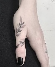 flower tattoo on the finger idea 