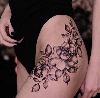 flower design tattoo on the hip for women