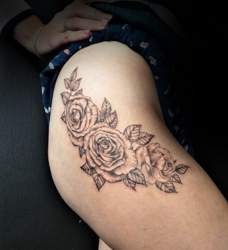 flowers tattoo on thigh for women