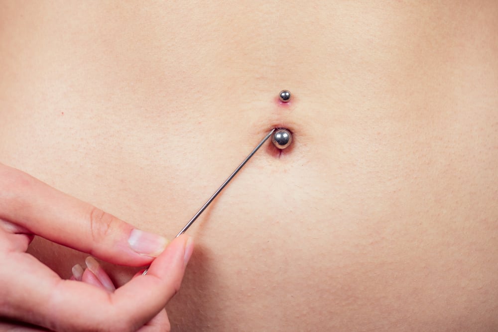 how long belly button piercing heal
