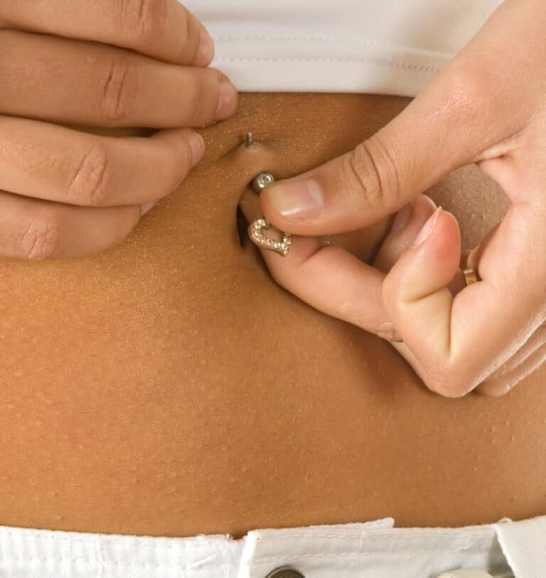 Why Do Belly Piercings Reject?